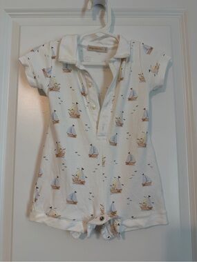 Baby Club Chic Polo Romper with Blue and Tan Accents